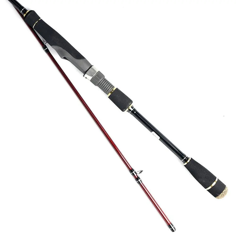 Detalhe do porta-carretos VSS da cana Eging DTD Calamari Hunter, com punho ergonómico em EVA preto, acabamentos dourados e blank vermelho.